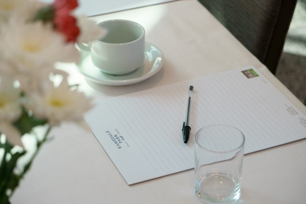 branded logo on notepads at a meeting venue space in calverton