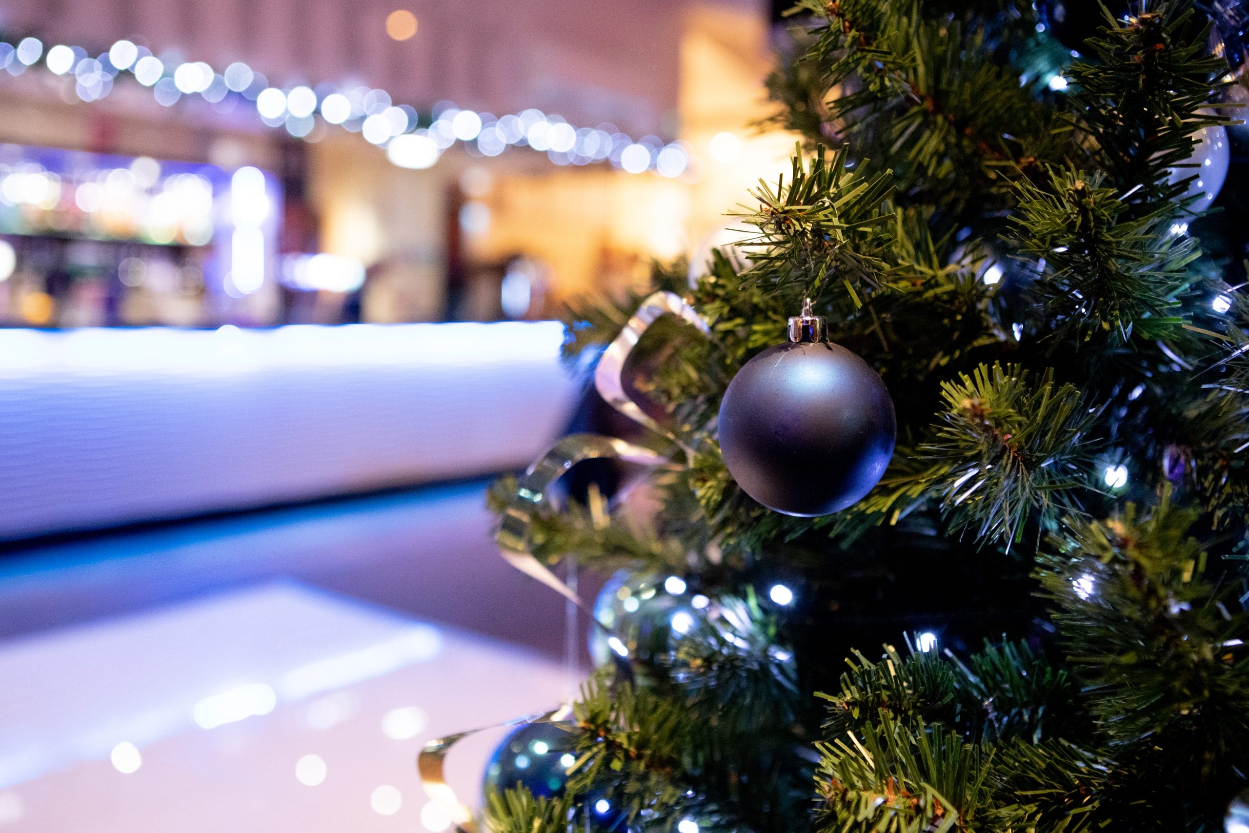 christmas tree infront of the bar at a christmas party venue in nottingham