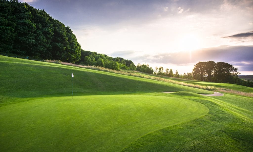 immacualte greens and grass at a golf course in nottingham