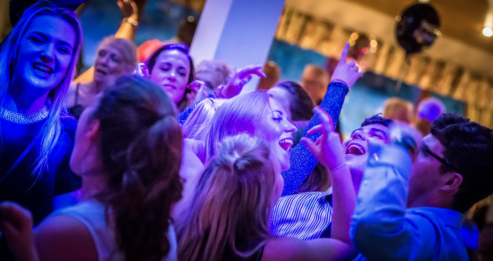 guests singing and dancing at a party venue in nottingham at a christmas party